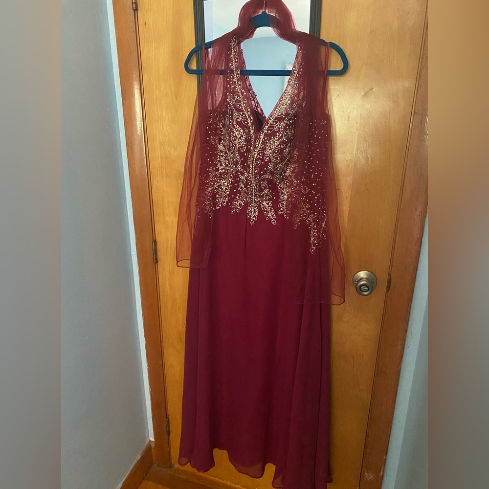 This dress is from Juno it’s a red dress with a shawl